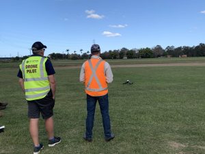 Student learning how to fly drone